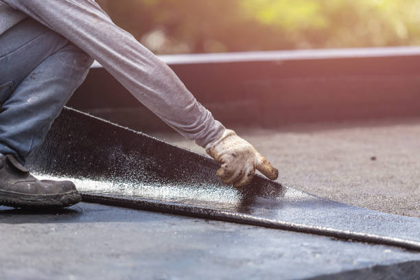 Professional Emergency Waterproofing technician working in Irvington, KY